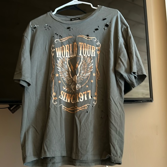 zutter Tops - NWOT distressed T-shirt, world tour since 1977